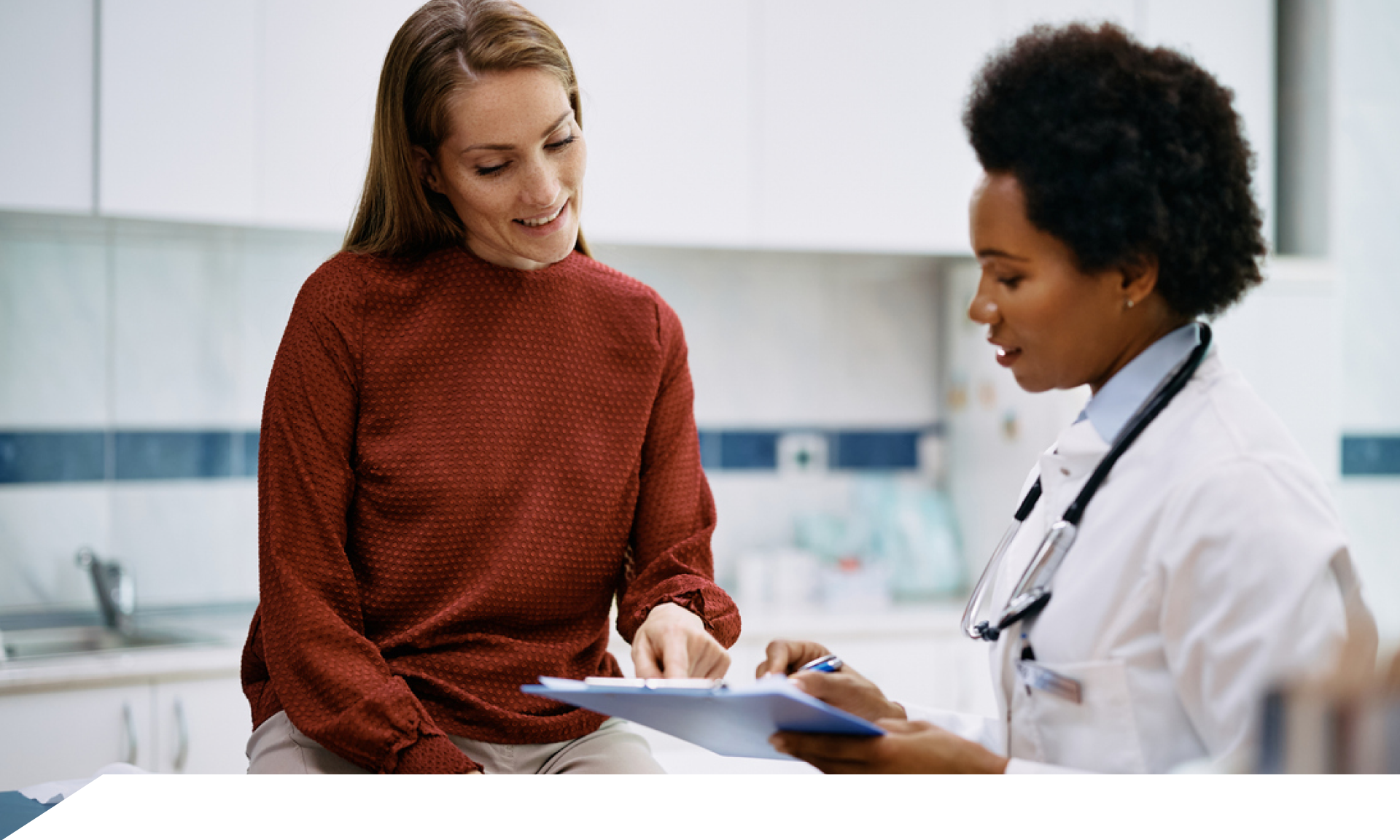 A woman talking with her doctor