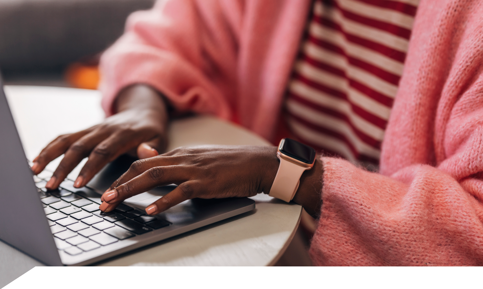 Woman typing on laptop