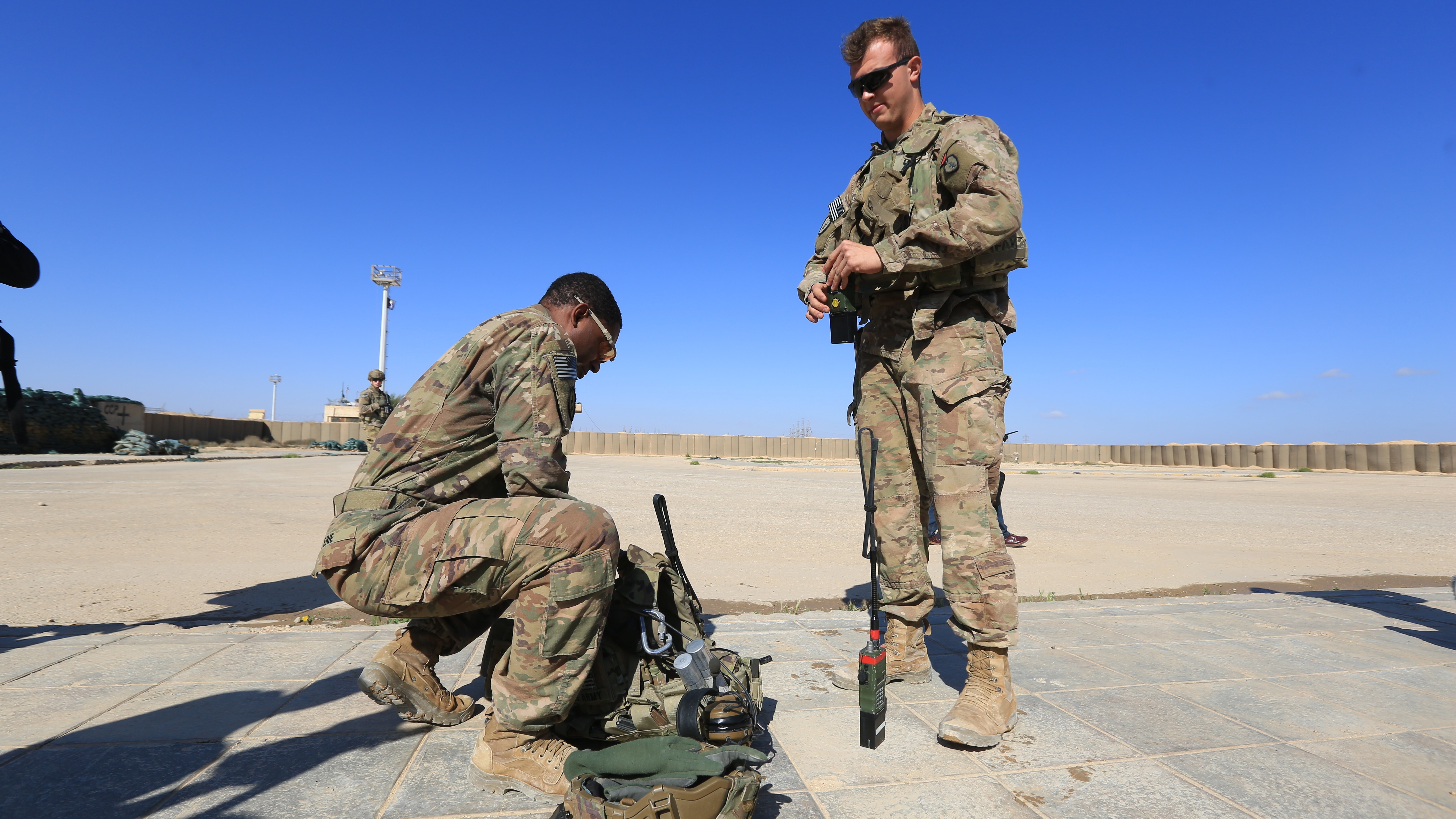 Soldiers from the US-led coalition forces are seen at the Al-Qaim Military Base in Iraq