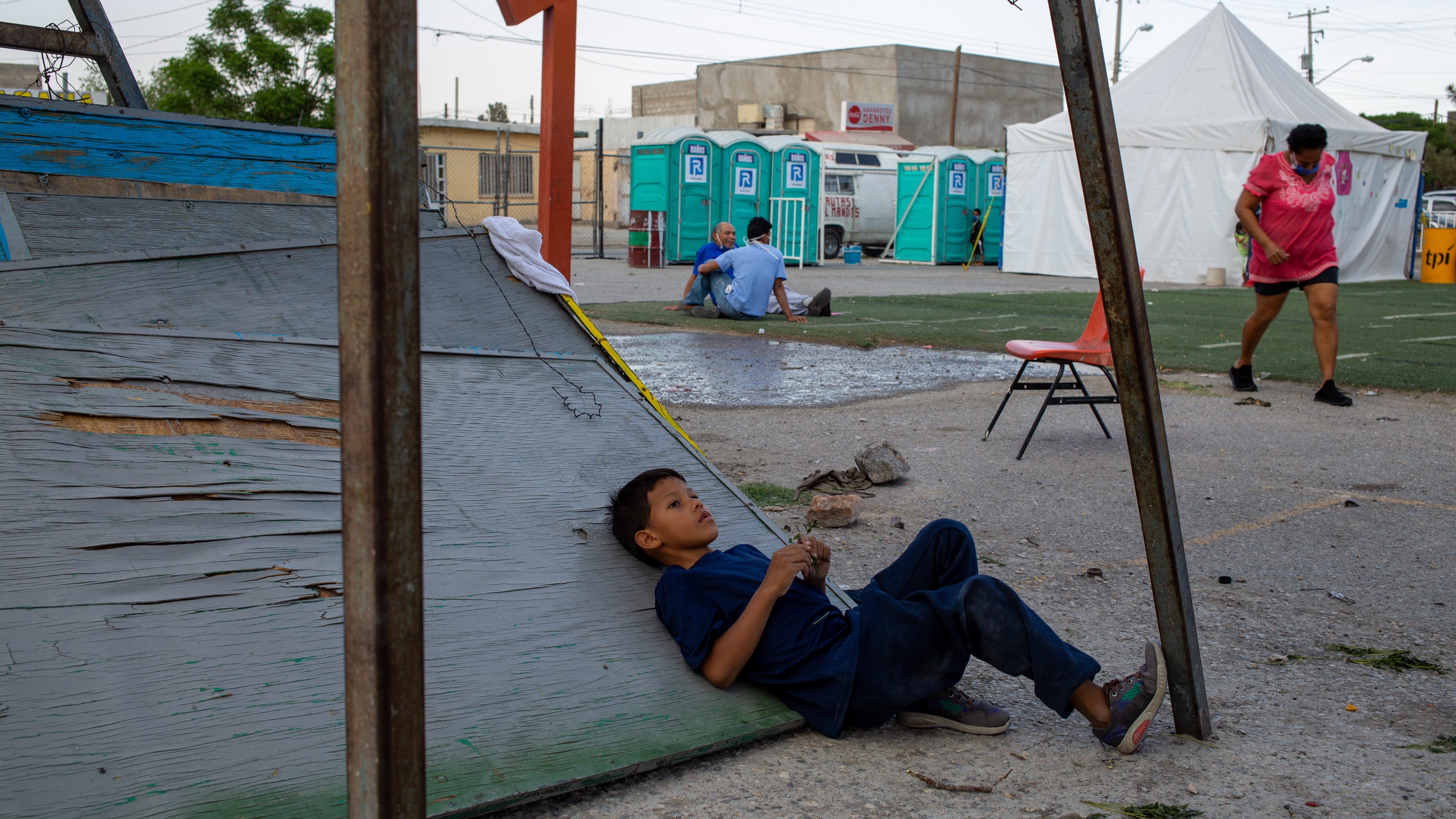Migrant children play in the courtyard of the shelter of Ciudad Juarez Chihuahua, Mexico, on April 26, 2021.