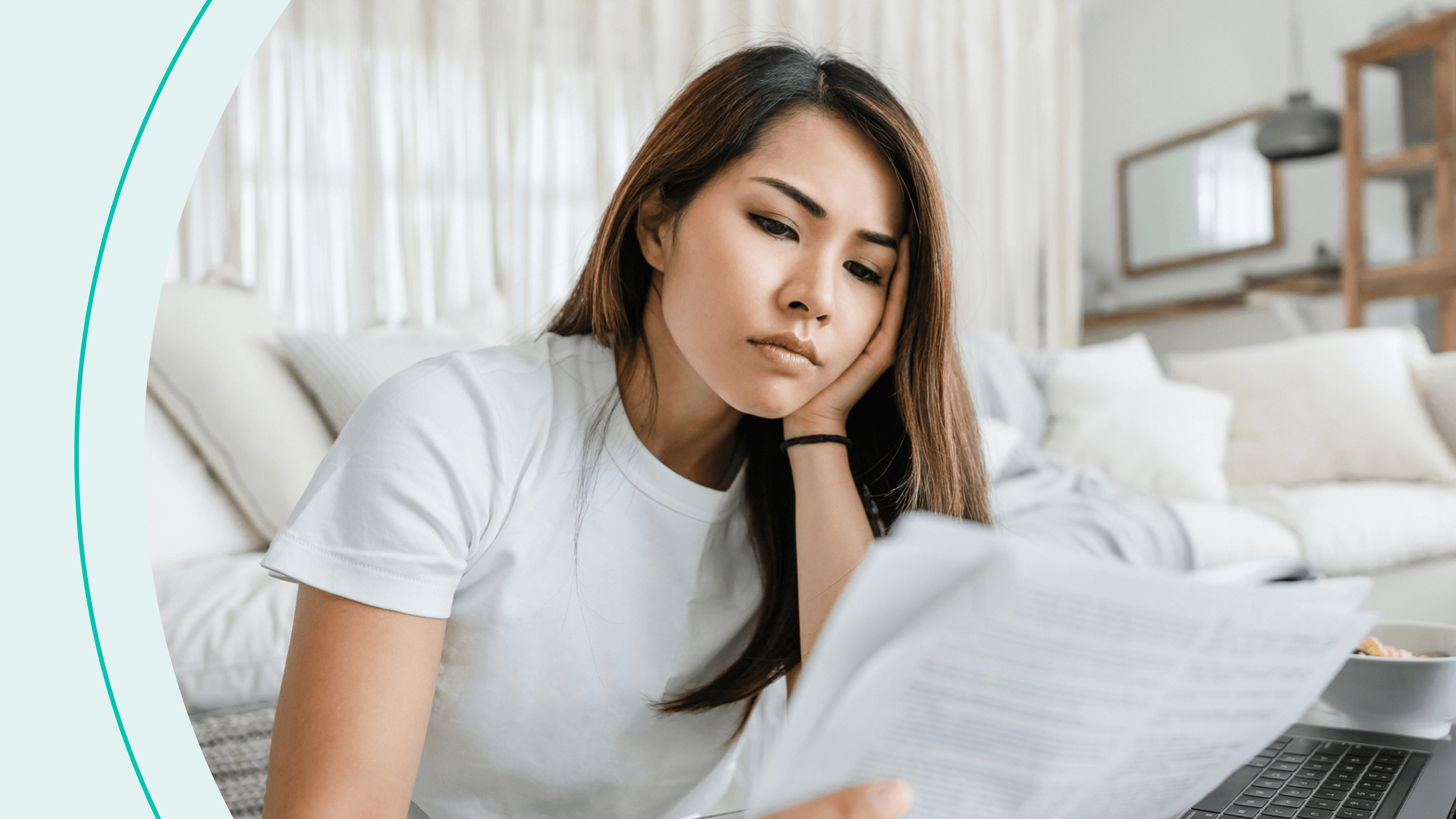 A woman looking at paperwork