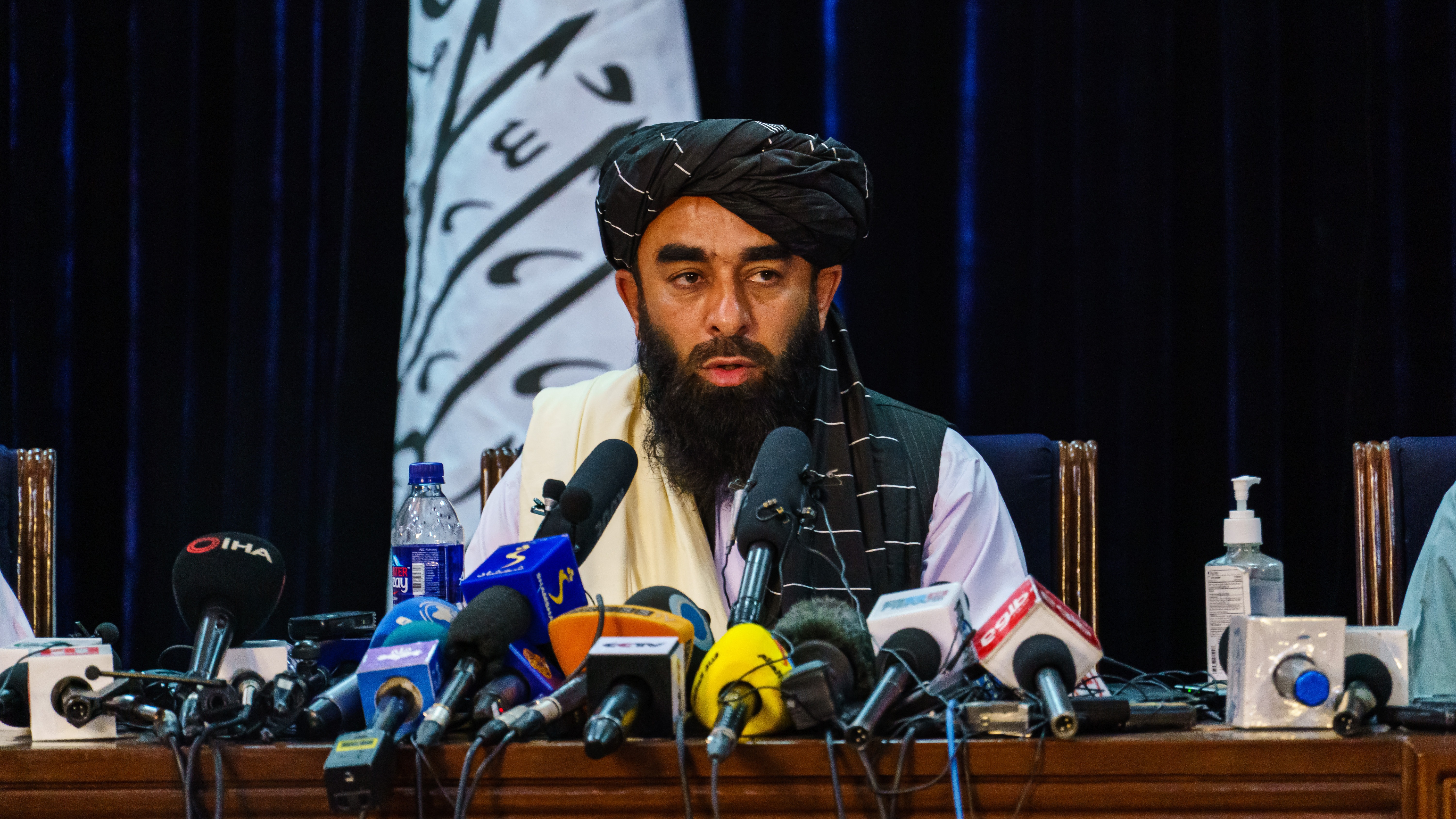 Zabihullah Mujahid, the Taliban spokesman for nearly 2 decades who worked in the shadows, makes his first-ever public appearance to address concerns about the Taliban' reputation
