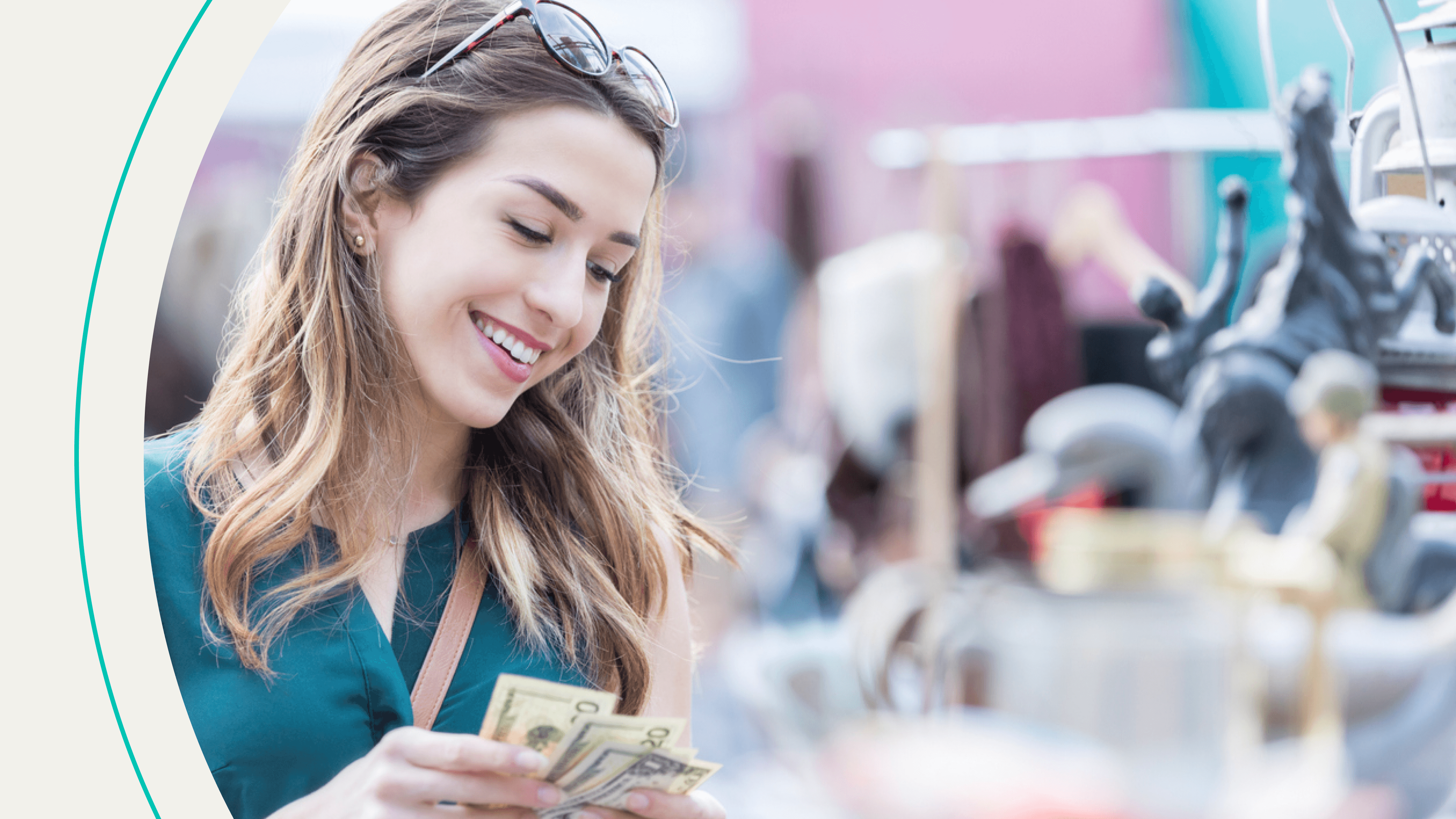 accessibility, woman smiling while counting cash