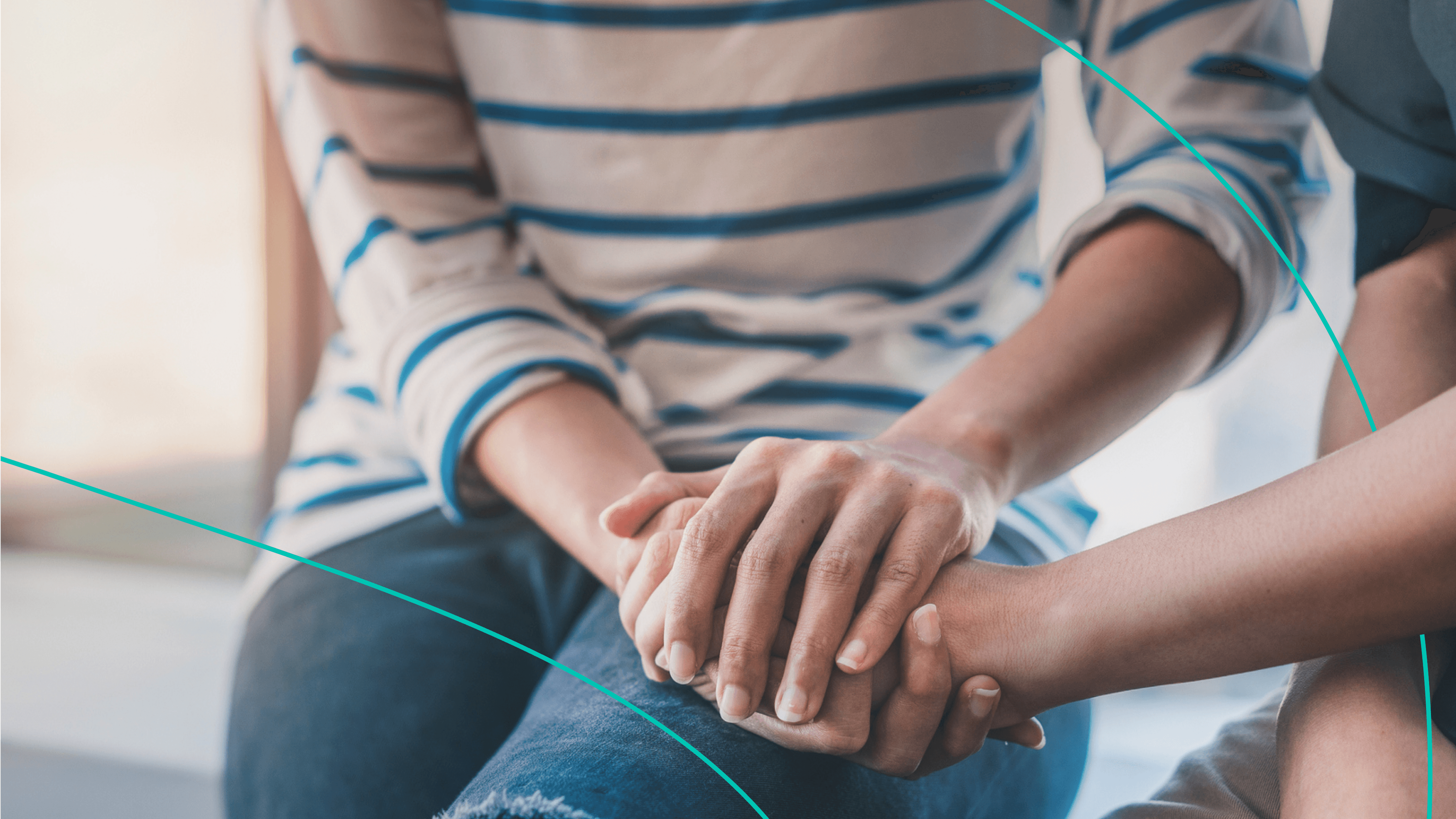 Two people holding hands