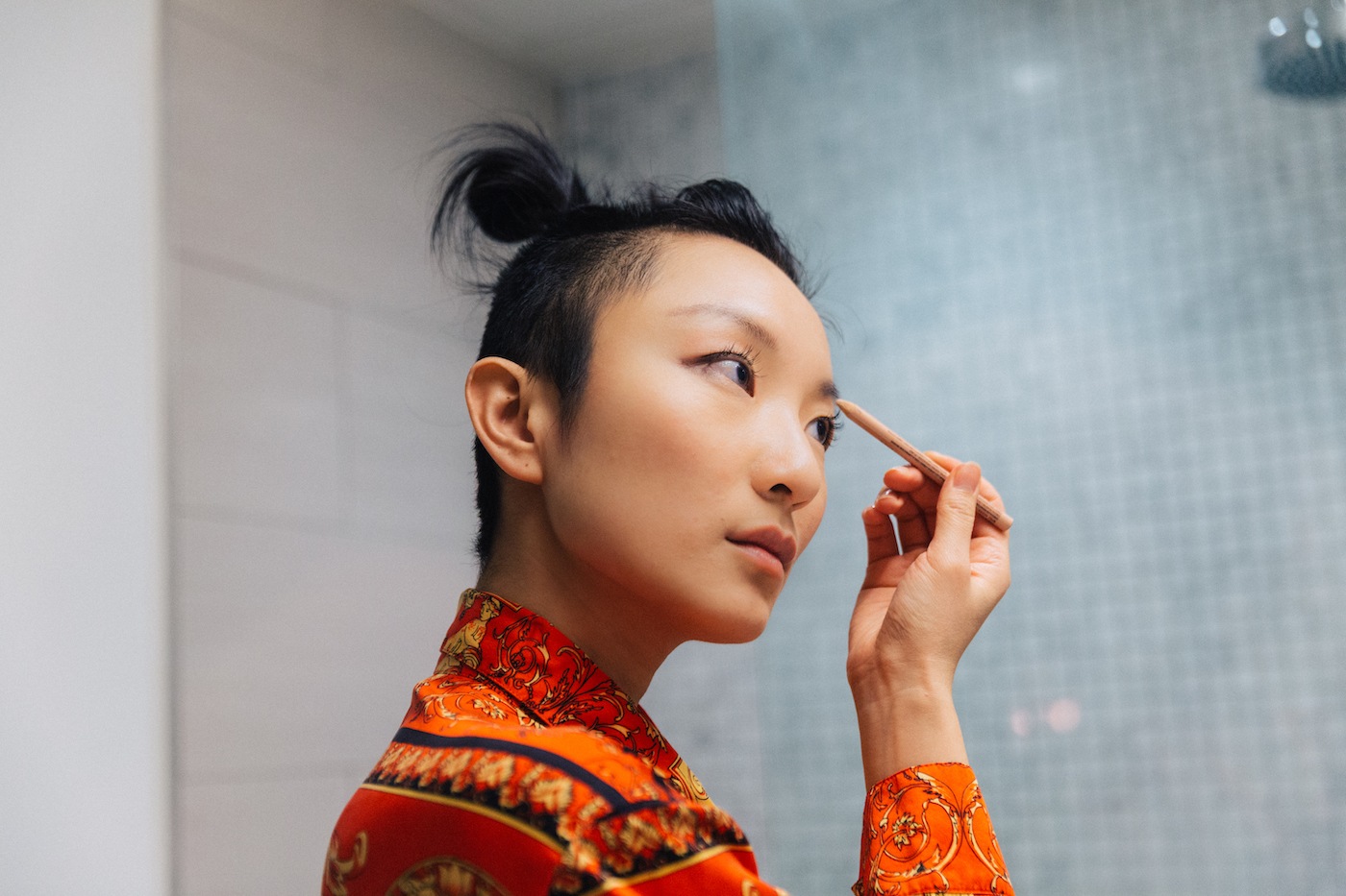 Featured image for I have an "eyebrow cowlick"—here's what two pros told me to do about it