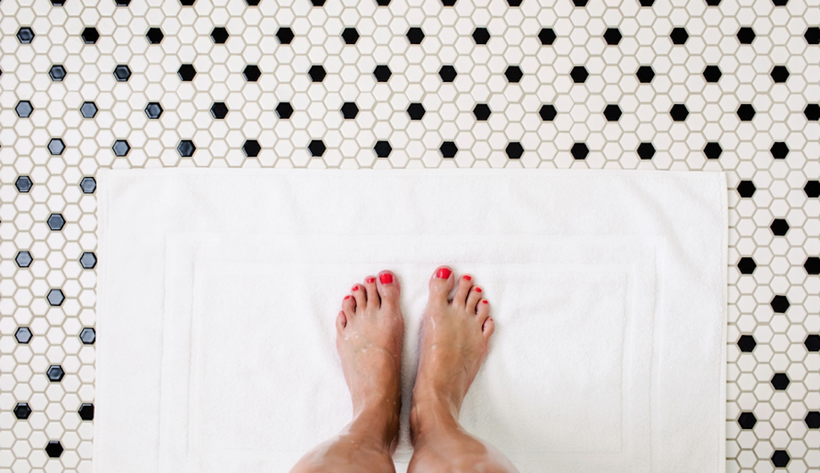 Featured image for Yes, You Have To Actively Wash Your Feet in the Shower To Keep Them Clean, According to a Podiatrist
