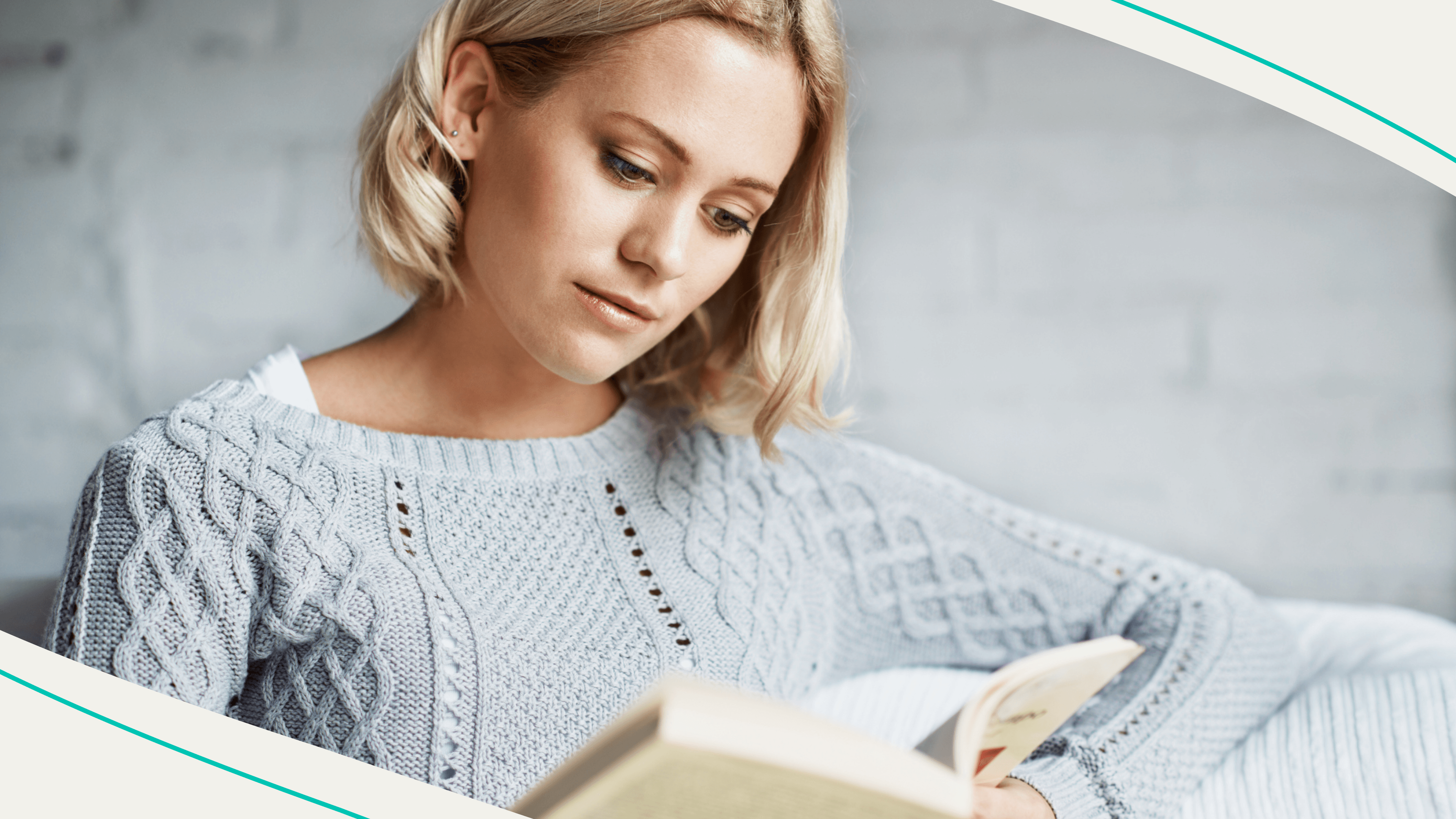 A woman reading a personal finance book