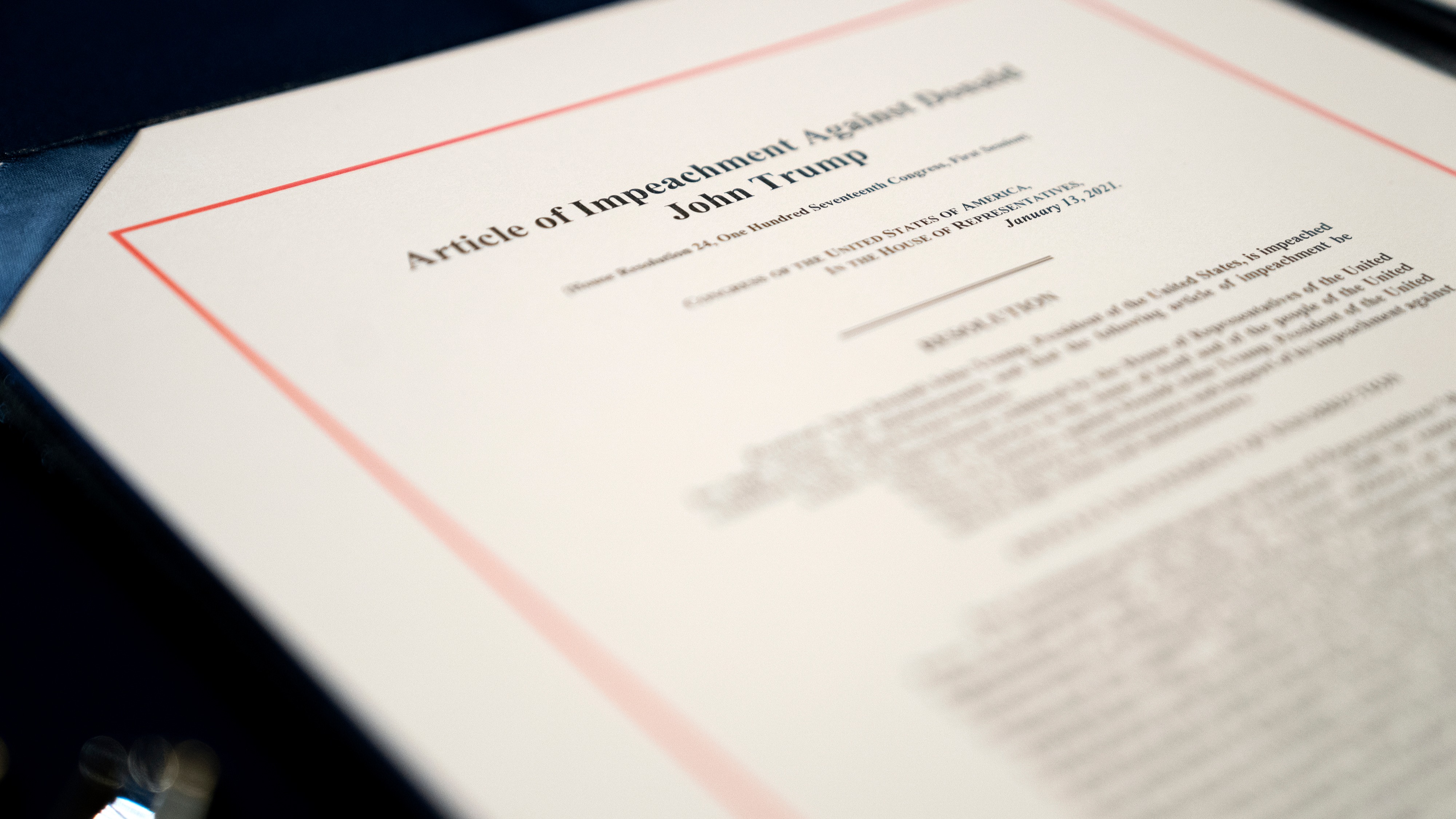 An article of impeachment for incitement of insurrection against President Donald Trump sits on a table at the U.S. Capitol on January 13, 2021.