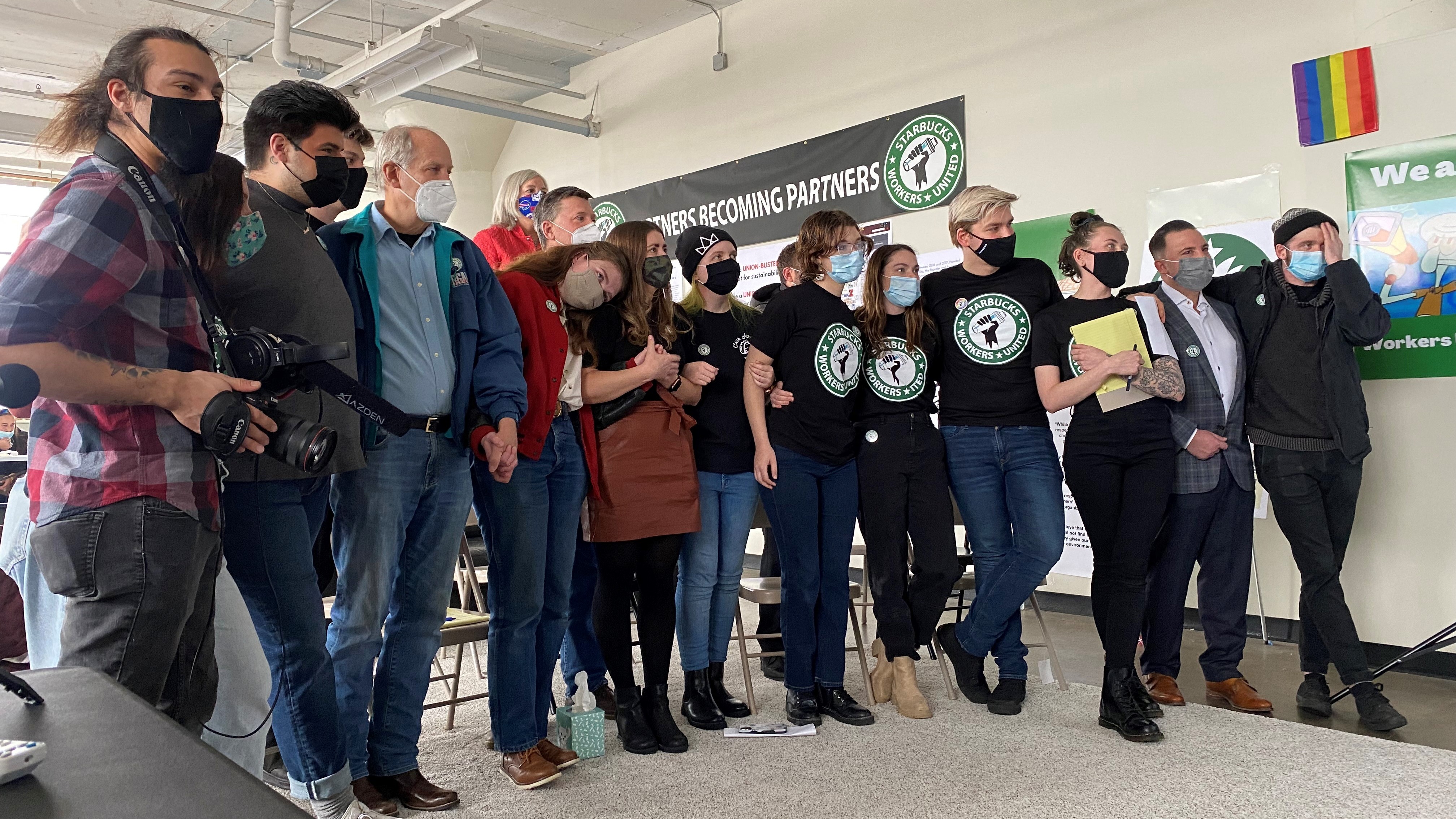 Starbucks employees wait for results of a vote count