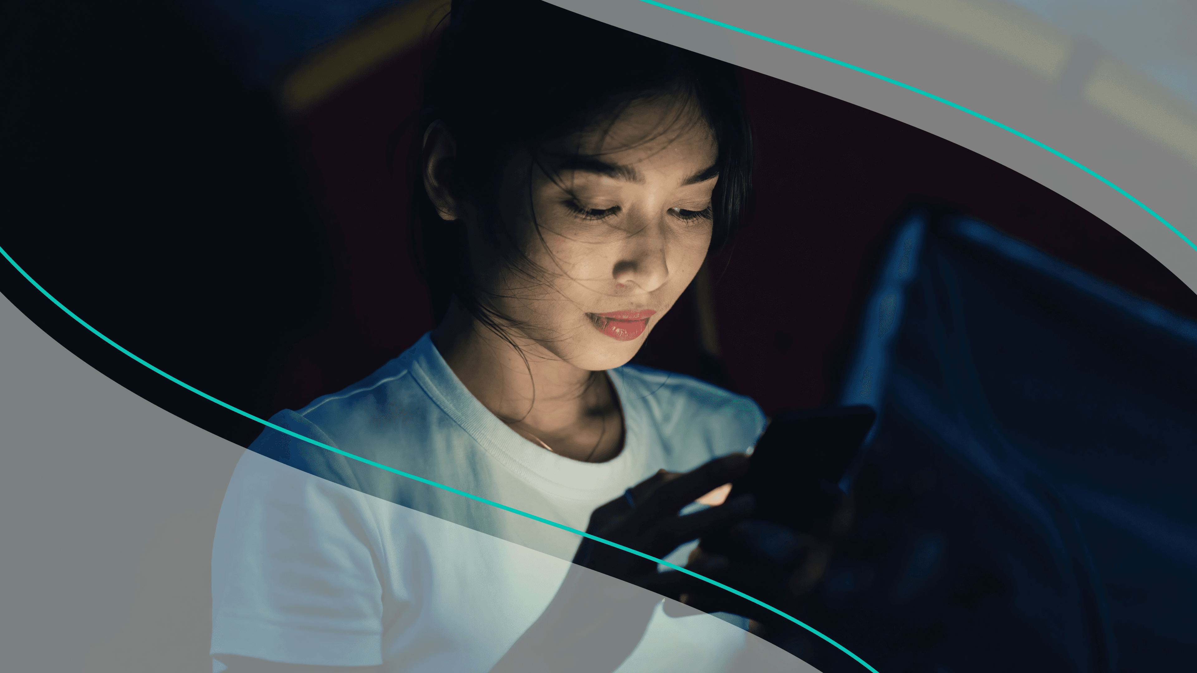 woman checking her phone in the dark stock image