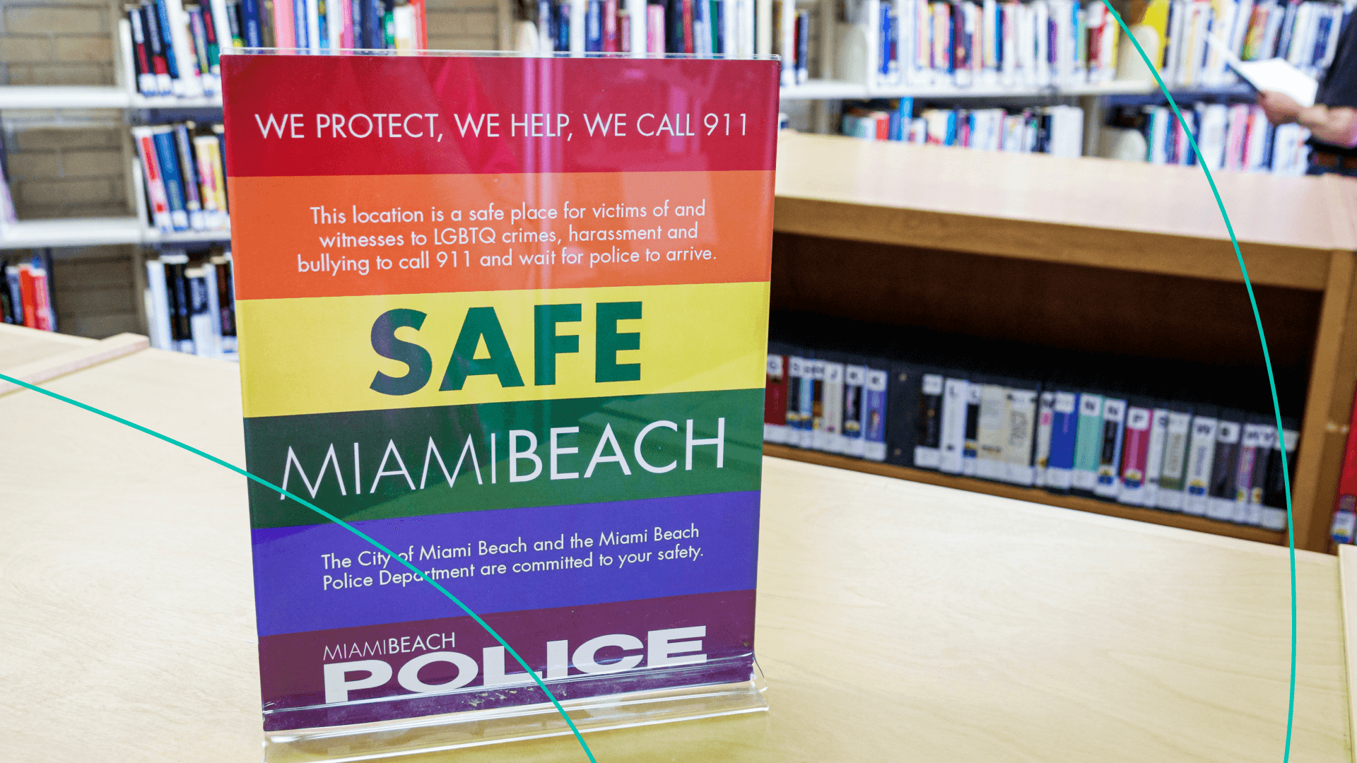 Florida, Miami Beach, North Shore Public Library, sign safe place for LGBTQ victims of harassment.