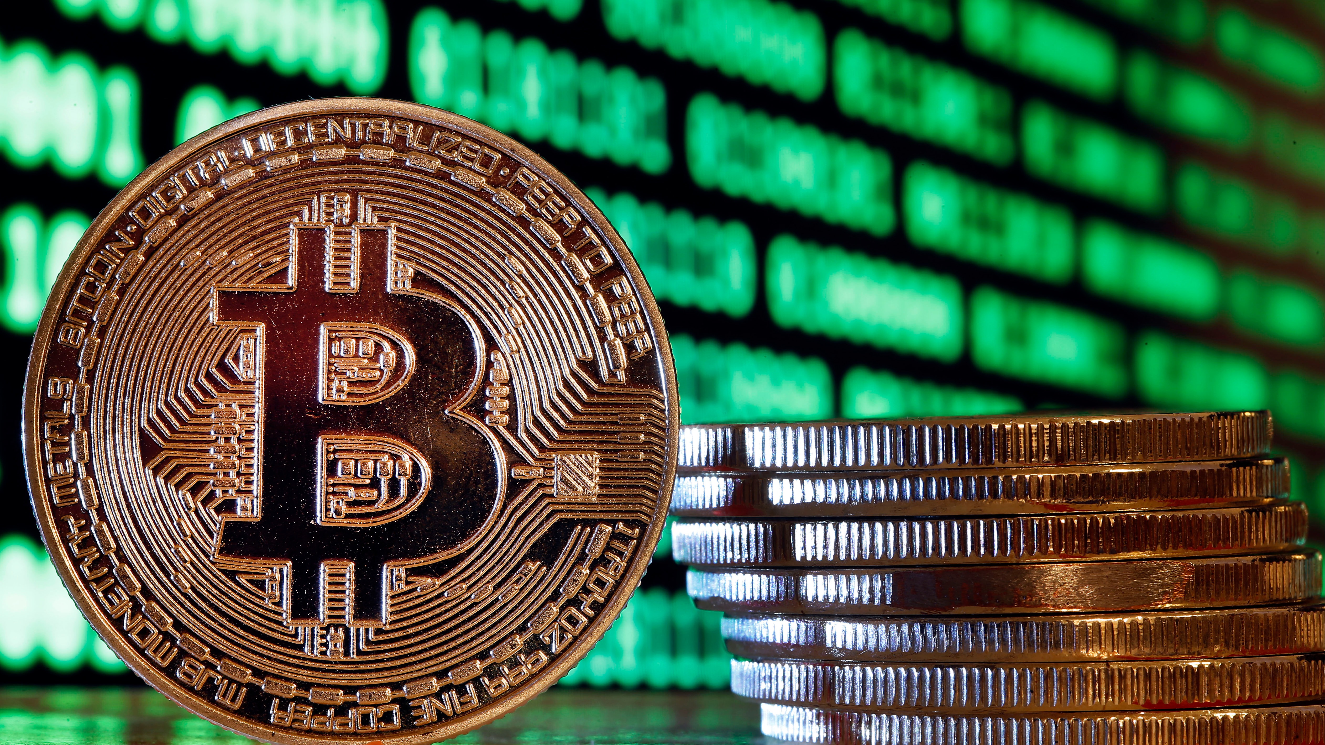 In this photo illustration, a visual representation of the digital Cryptocurrency, Bitcoin is displayed on January 15, 2018 in Paris, France.