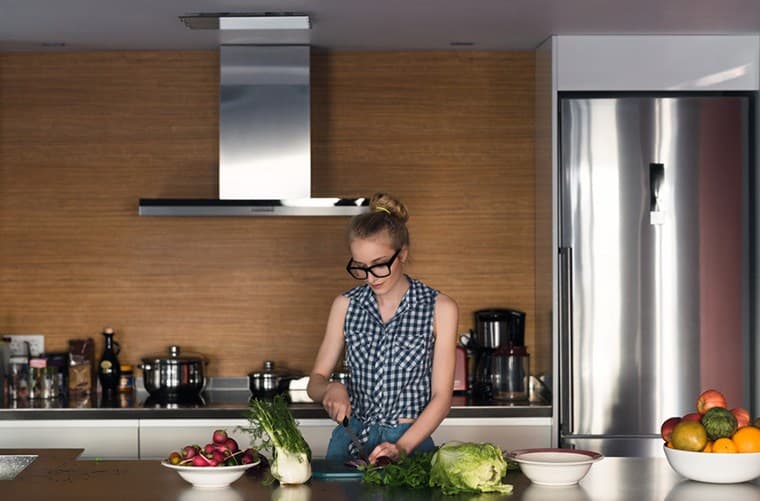 woman chopping veggies