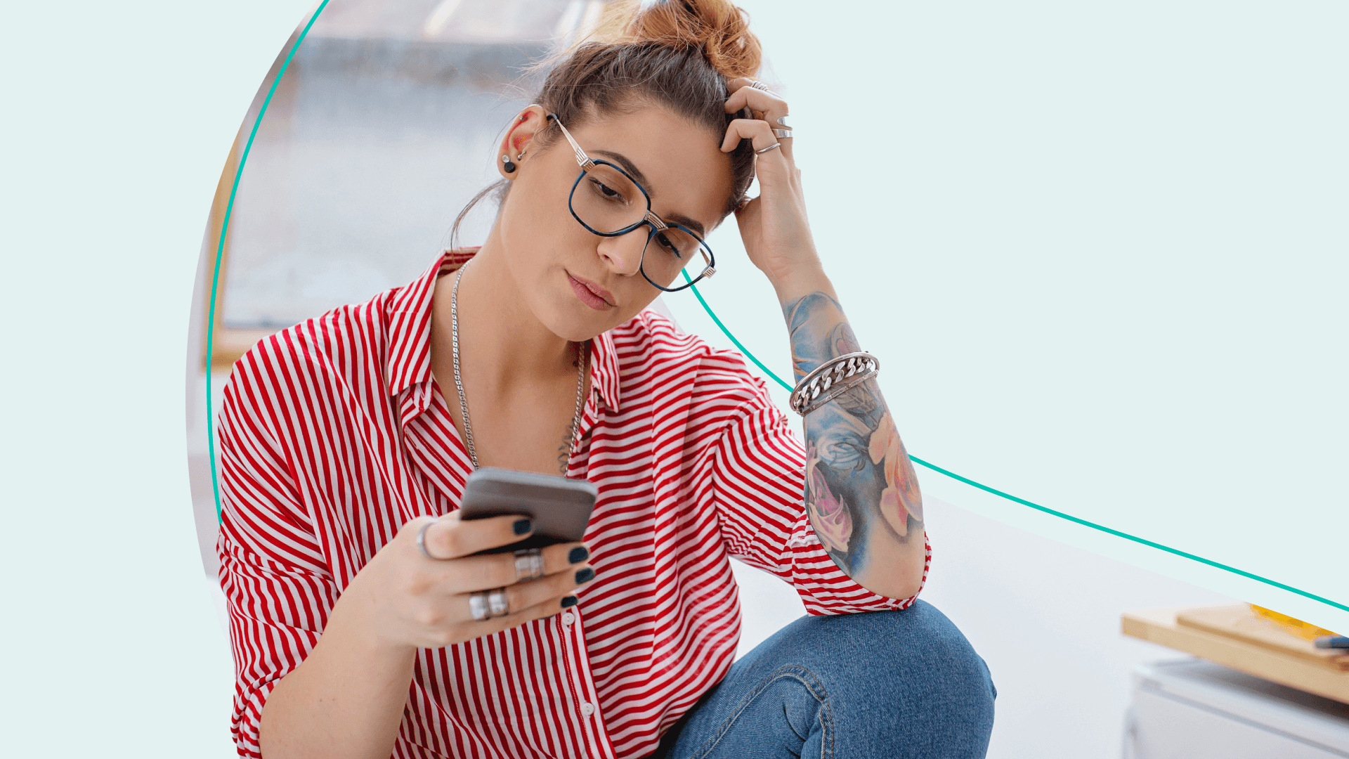 woman staring at phone screen